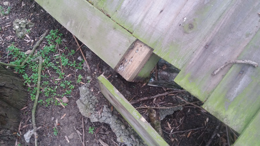 Broken fence post to east of Manrico Drive